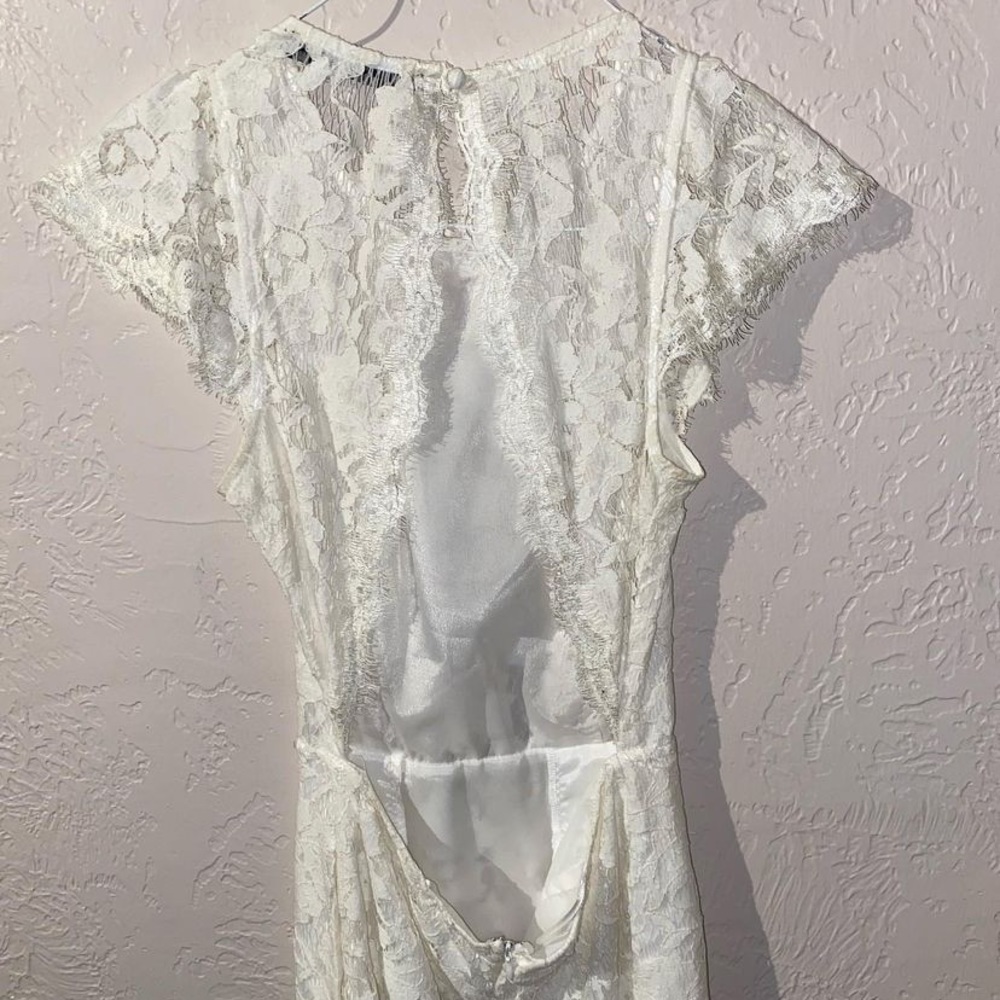 White lace open back dress